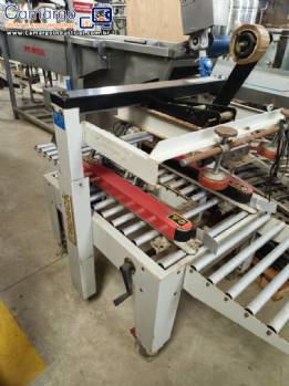 Fechadora seladora de caixa de papel�o Strapack